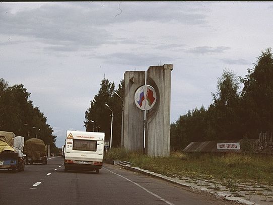 Caravan at border monument