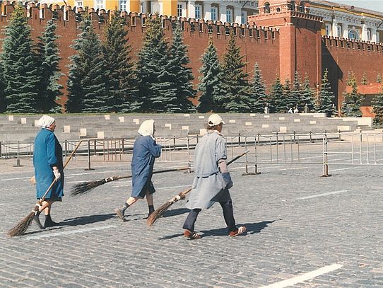 Women with brooms